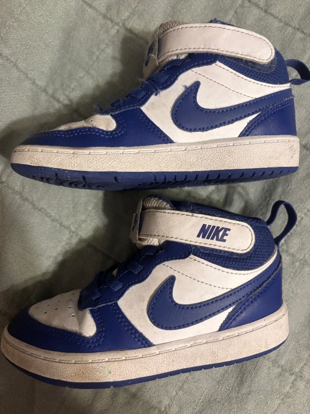 Blue and white Nike high tops